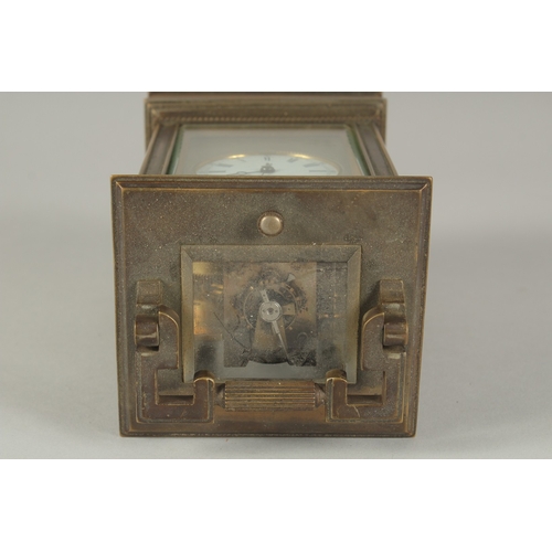 1206 - A 19TH CENTURY FRENCH BRASS CARRIAGE CLOCK with column sides.  No. 6927. 5ins high.