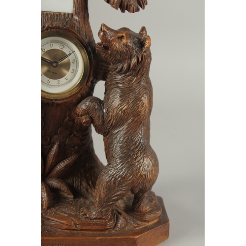 1207 - A GOOD CARVED BLACK FOREST CLOCK AND THERMOMETER carved with two bears. 5ins high.