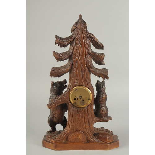 1207 - A GOOD CARVED BLACK FOREST CLOCK AND THERMOMETER carved with two bears. 5ins high.