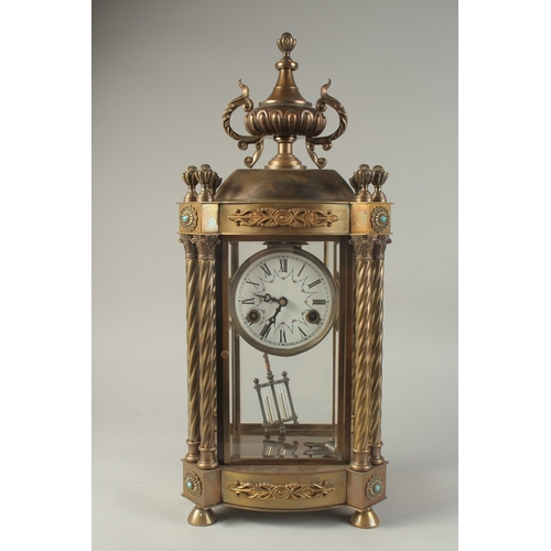 1211 - A 19TH CENTURY FRENCH BRONZE FOUR GLASS CLOCK with urn finial and twist column sides. 1ft 10ins high... 