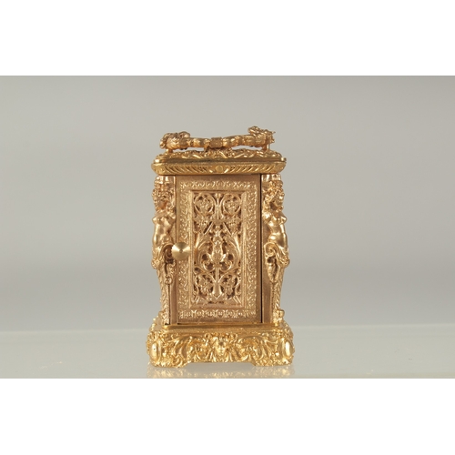 1214 - A GOOD MINIATURE CAST BRONZE CARRIAGE CLOCK the sides with caryatid figures. 2.5ins high.