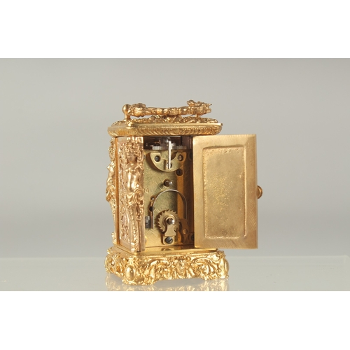 1214 - A GOOD MINIATURE CAST BRONZE CARRIAGE CLOCK the sides with caryatid figures. 2.5ins high.