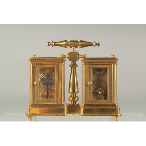 1215 - A GOOD MINIATURE BRONZE DOUBLE CARRIAGE CLOCK AND BAROMETER with carrying handle. 4ins high.