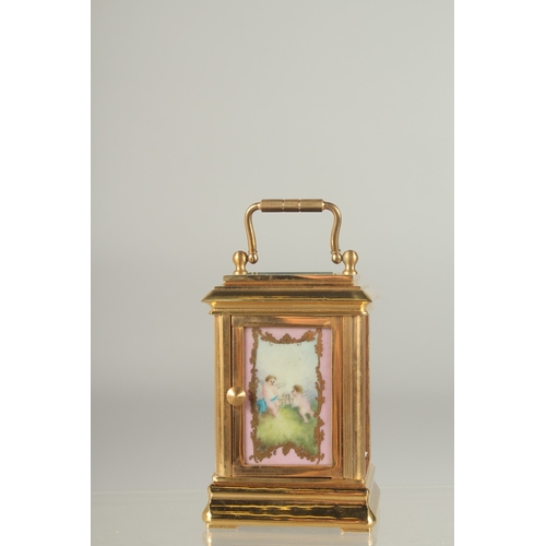 1216 - A GOOD MINIATURE PINK PORCLELAIN MULTI DIAL CARRIAGE CLOCK. 3ins high.