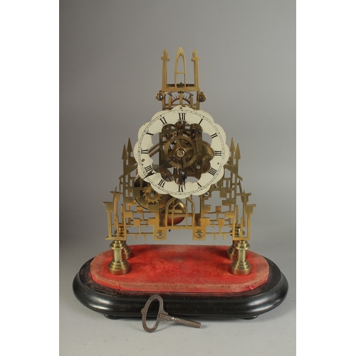 1220 - A GOOD VICTORIAN BRASS CATHEDRAL SKELETON CLOCK with fussee movement and silvered dial. 13ins high o... 