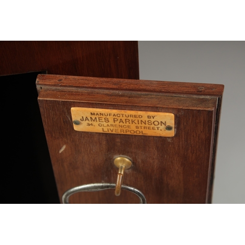 1222 - A VICTORIAN MAHOGANY STANDING CLOCK with circular silvered dial, 11ins. Manufactured by JAMES PARKIN... 