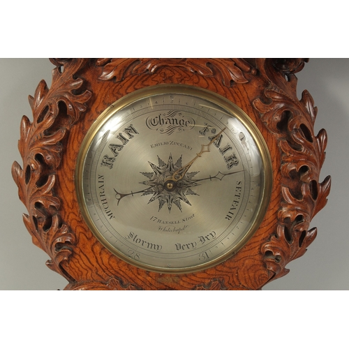 1228 - A GOOD 19TH CENTURY WHEEL BAROMETER / THERMOMETER, the well carved wood case with 