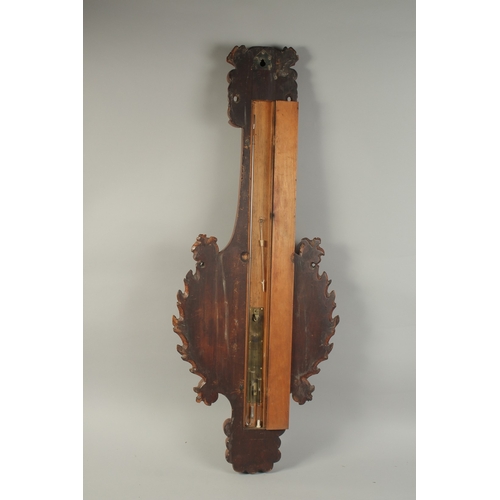 1228 - A GOOD 19TH CENTURY WHEEL BAROMETER / THERMOMETER, the well carved wood case with 