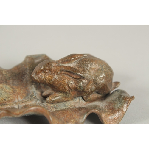 1246 - AFTER A. BARYE A SPELTER RABBIT ON A LEAF.  16ins long.