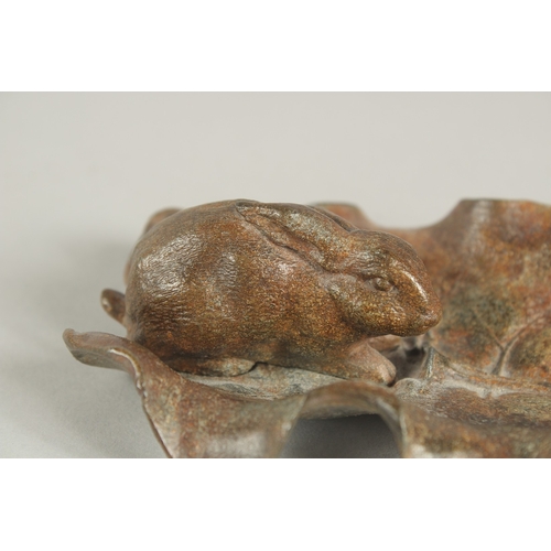 1246 - AFTER A. BARYE A SPELTER RABBIT ON A LEAF.  16ins long.