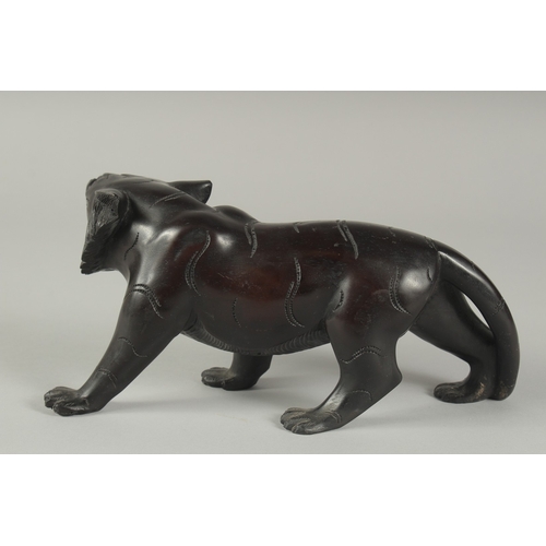 1251 - A BRONZE TIGER.  9.5ins long.