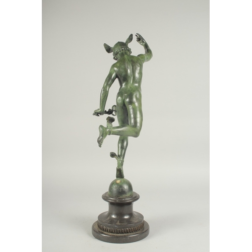 1264 - GIAMBOLOGNA AN EARLY BRONZE FIGURE OF MERCURY. Signed on a circular base. 21ins high.