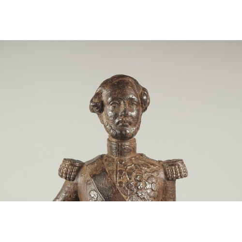 1265 - LOUIS PHILIPPE. A CAST IRON FIGURE OF DUC  D' ORLEANS. Inscribed.  18ins high.