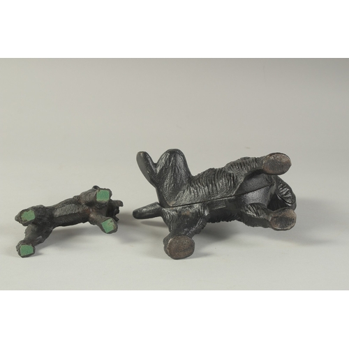 1271 - TWO CAST IRON DOGS. 7ins & 4ins.