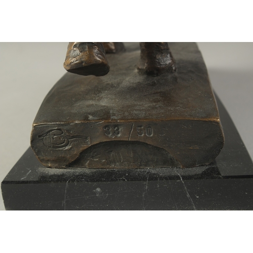 1273 - A BRONZE ELEPHANT on a marble base. 8ins high.