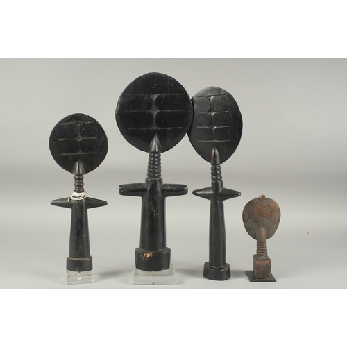 1285 - A FAMILY OF FOUR CARVED WOOD AFRICAN FIGURES. 15ins, 13ins, 11ins & 6ins.