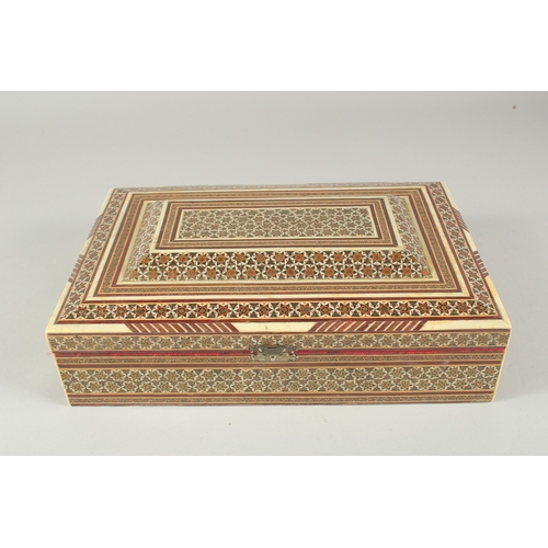 1331 - AN INDIAN INLAID JEWEL BOX.  11ins long.