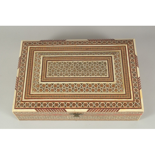 1331 - AN INDIAN INLAID JEWEL BOX.  11ins long.