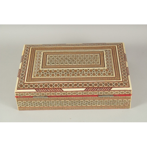 1331 - AN INDIAN INLAID JEWEL BOX.  11ins long.