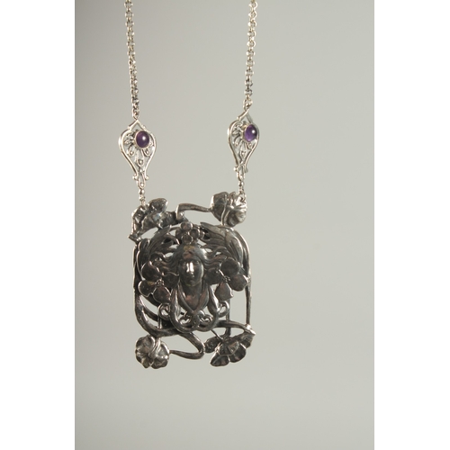 1573 - A SILVER NOUVEAU STYLE GIRL NECKLACE.