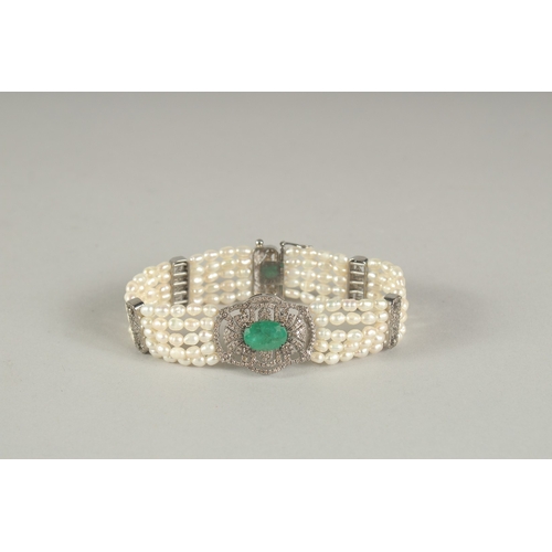 1574 - A GOOD DIAMOND, EMERALD AND FIVE ROW PEARL BRACELET.