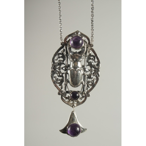 1584 - A DECO STYLE SILVER LAPIS SCARAB PENDANT AND CHAIN.