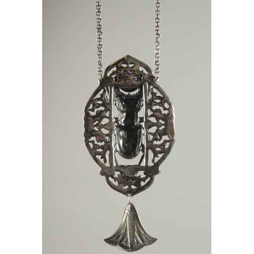 1584 - A DECO STYLE SILVER LAPIS SCARAB PENDANT AND CHAIN.