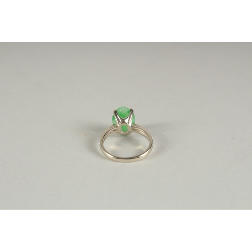 1591 - A WHITE GOLD JADE RING.