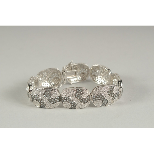 1592 - A SILVER CZ BRACELET.