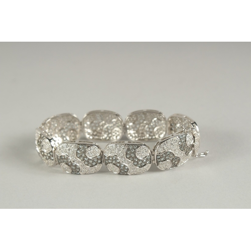 1592 - A SILVER CZ BRACELET.