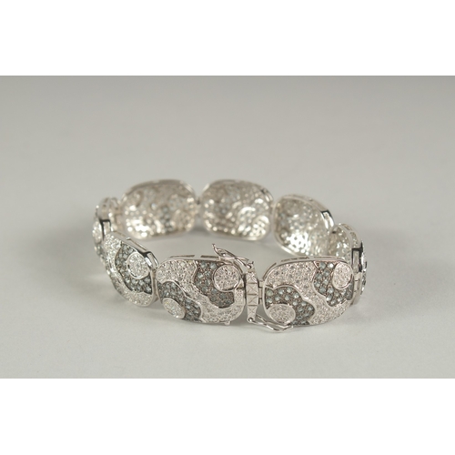 1592 - A SILVER CZ BRACELET.