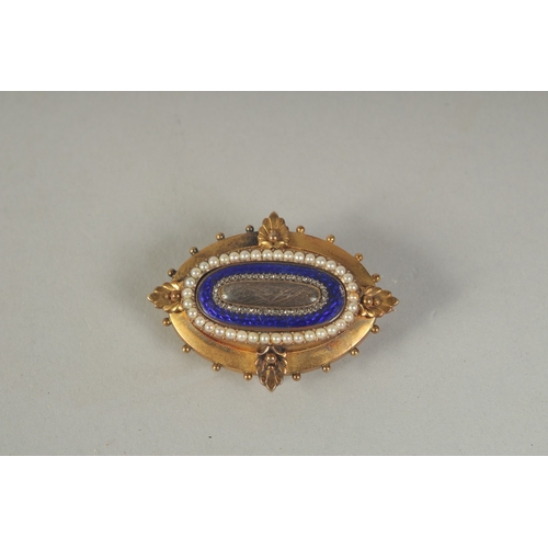 1596A - A MATCHING 15CT GOLD BROOCH AND PENDANT with blue enamel and seed pearls.