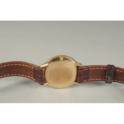 1602 - A GENTLEMAN'S OMEGA DE VILLE WRIST WATCH with leather strap. 1603.