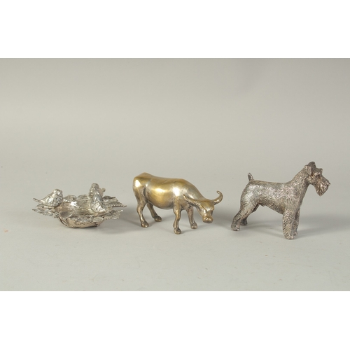 1684 - A CAST DOG, A BOWL AND A COW. (3).