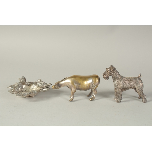 1684 - A CAST DOG, A BOWL AND A COW. (3).