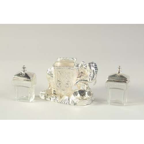 1691 - A SILVER PLATED NOVELTY CRUET SET, modelled as an elephant with cruets on it's back. 4.5ins long.