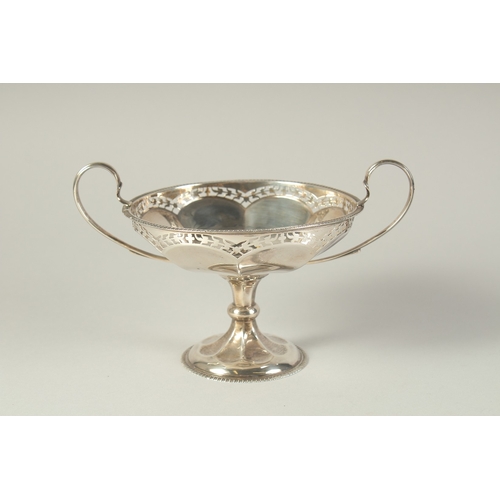 1704 - A GEORGE V CIRCULAR SILVER TWO HANDELED TAZZA. 5ins diameter, London 1919.  Weight: 6ozs.