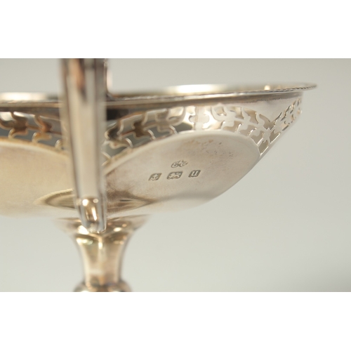 1704 - A GEORGE V CIRCULAR SILVER TWO HANDELED TAZZA. 5ins diameter, London 1919.  Weight: 6ozs.