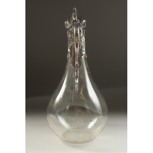 1708 - A PLAIN GLASS CLARET JUG with silver mounts and handle. London 1933.