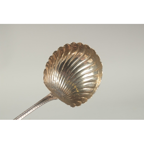 1716 - A GEORGE III BRIGHT CUT SILVER SHELL LADLE. London 1767.