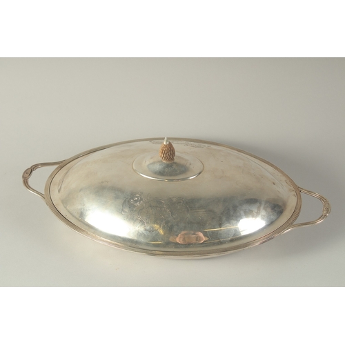 1752 - A GEORGE III SILVER OVAL TWO HANDLED TUREEN AND COVER, London 1797, Maker E. E. Wall, 30ozs.