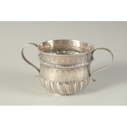 1758 - A GEORGE 1ST SILVER TWO HANDLED CIRCULAR PORRINGER. 3ins diameter, 2.5ins high. London 1718.  Maker:... 