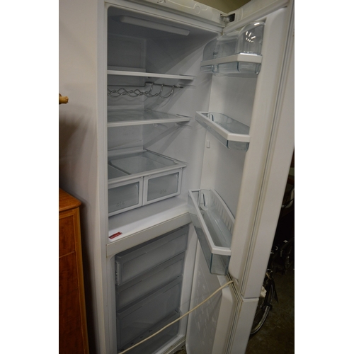 145 - A good Hotpoint upright fridge/freezer.