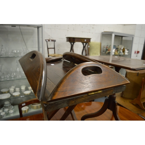 196 - A butlers style tray top table with folding flaps.