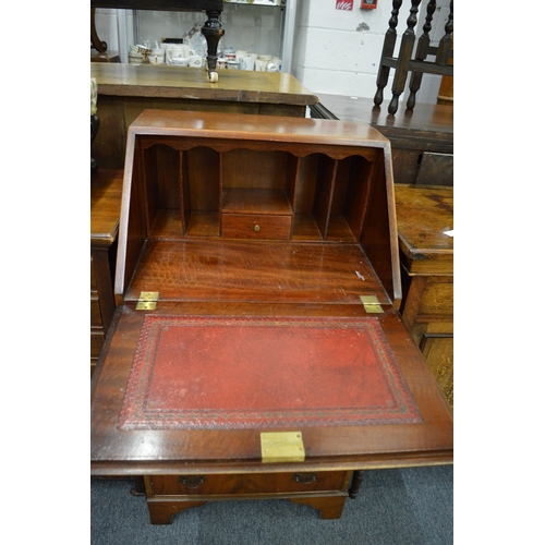 202 - 20A small reproduction mahogany bureau.