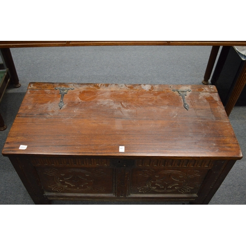 207 - An 18th century oak coffer with later top.