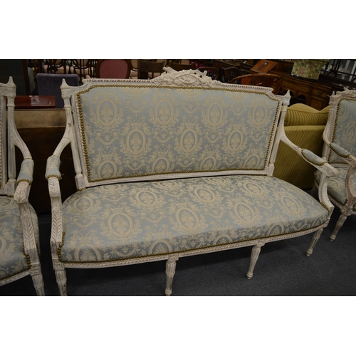 209 - A Victorian style painted and upholstered three piece salon suite comprising three seater settee and... 