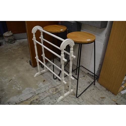 21 - A painted towel rail and a pair of stools.