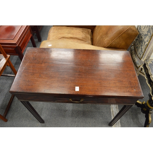 211 - A 19th century mahogany rectangular fold-over tea table with a single frieze drawer on moulded squar... 