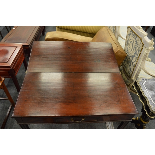 211 - A 19th century mahogany rectangular fold-over tea table with a single frieze drawer on moulded squar... 